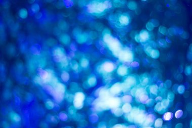 Mavi bokeh. Mavi arkaplanda bulanık ışık.