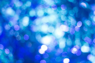 Mavi bokeh. Mavi arkaplanda bulanık ışık.