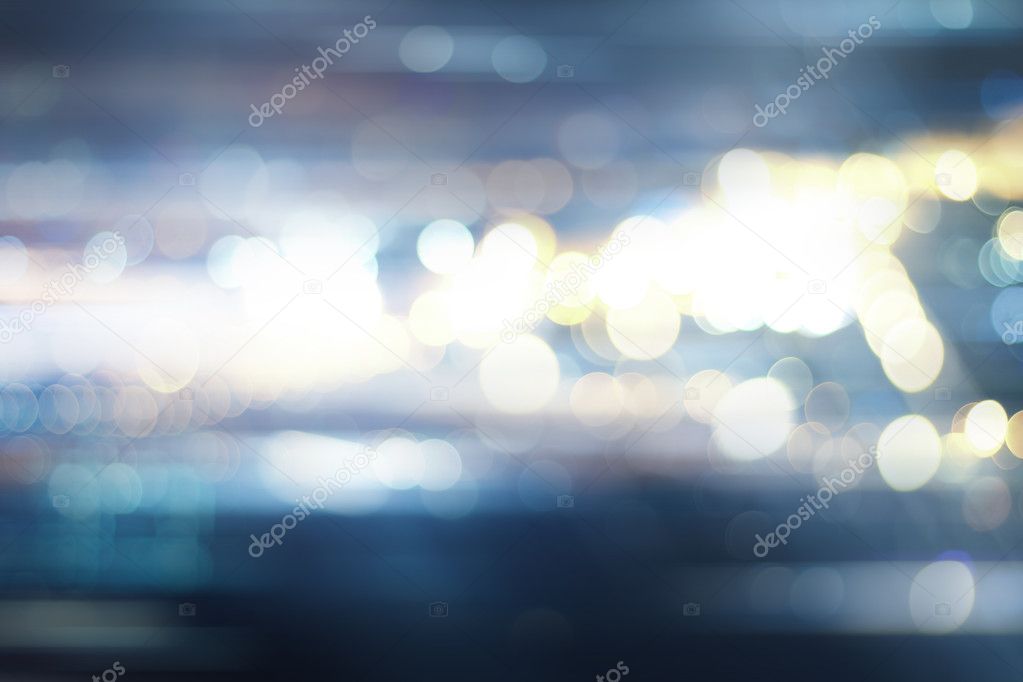 Defocused city night filtered bokeh abstract background.