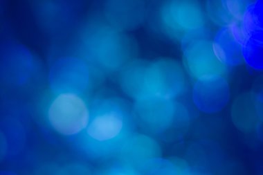 Mavi bokeh. Mavi arkaplanda bulanık ışık.