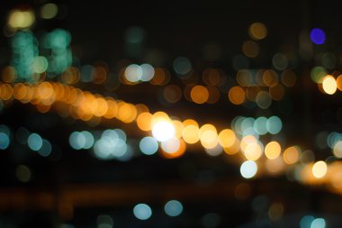 Yokedilmiş şehir gecesi filtrelenmiş Bokeh soyut arkaplanı.