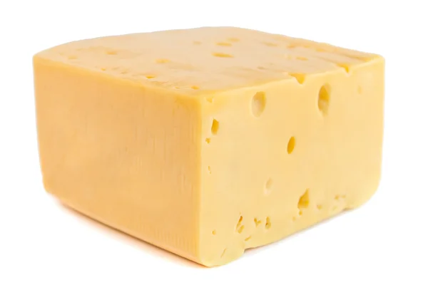 Un trozo de queso aislado sobre un fondo blanco —  Fotos de Stock