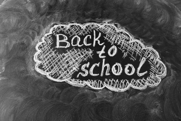 Back to school background with title "Back to school"  written by white chalk on the black chalkboard — Stock Photo, Image