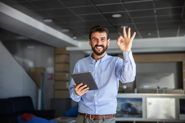 Smiling Bearded Ceo Standing Lobby Export Firm Showing Okay Gesture — Stock Photo, Image