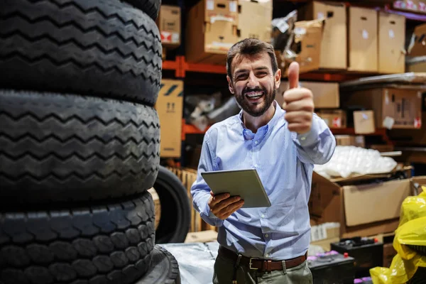 Smiling Bearded Excited Businessman Standing Storage Export Firm Holding Tablet — Stockfoto