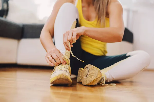Close Sportswoman Sitting Floor Home Tying Shoelace Preparing Exercising — Stock Photo, Image
