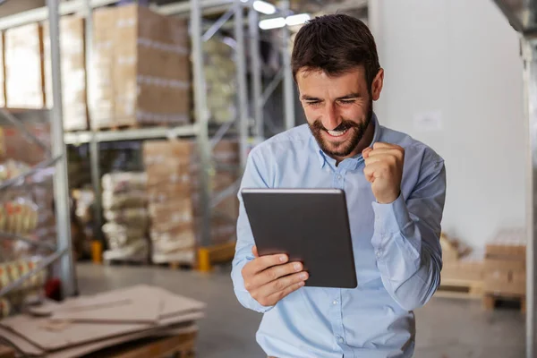 Young Cheerful Attractive Bearded Supervisor Standing Warehouse Celebrating Success Looking — Stock Photo, Image
