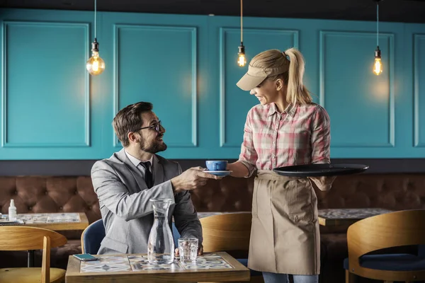 Coffee Break Blonde Waitress Wears Uniform Serves Coffee Male Guest — Stock Photo, Image