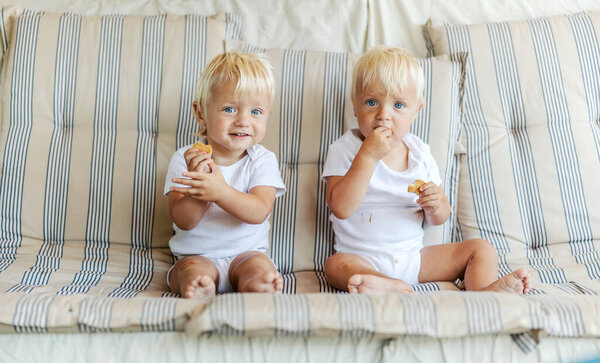 Two Little Twins Two Identical Babies White Clothes Children Sit Royalty Free Stock Images
