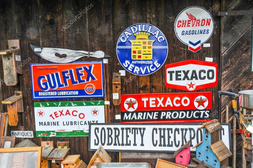Vintage oil company and other transportation metal signs