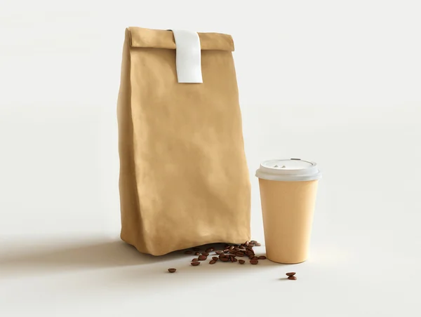 Papiertüte und Tasse Kaffee — Stockfoto