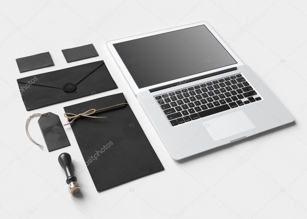 Set of  paper branding elements with laptop
