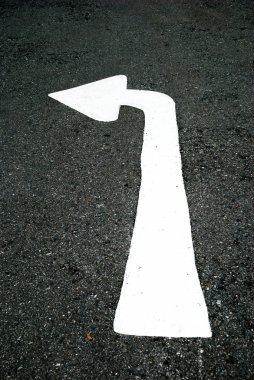 Turn-left arrow on street clipart