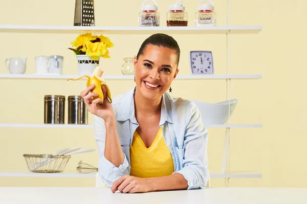 Attractive woman girl eating banana healthy food — Stock Photo, Image