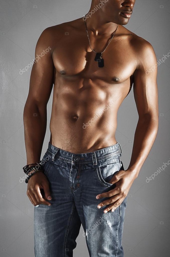 Model wearing jeans Stock Photo by ©geoffgoldswain 121505844