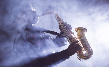 Musician playing saxophone clipart