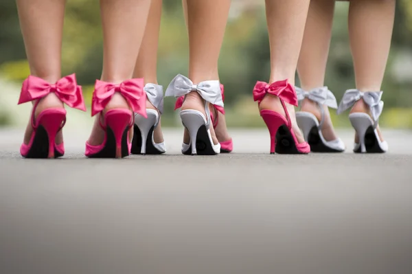 Brides maids feet walking in street — Stock Photo, Image
