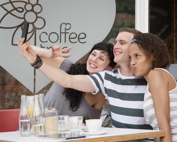 Friends siting in cafe — Stock Photo, Image
