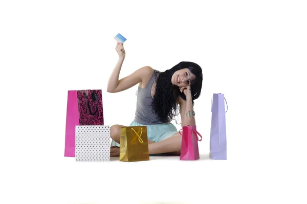 Shopaholic surrounded by bags — Stock Photo, Image