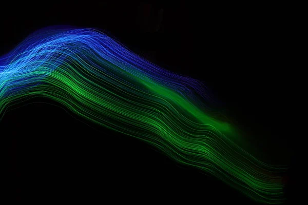 Blue-green light lines on a black background. . Color light painting. Long exposure photography.