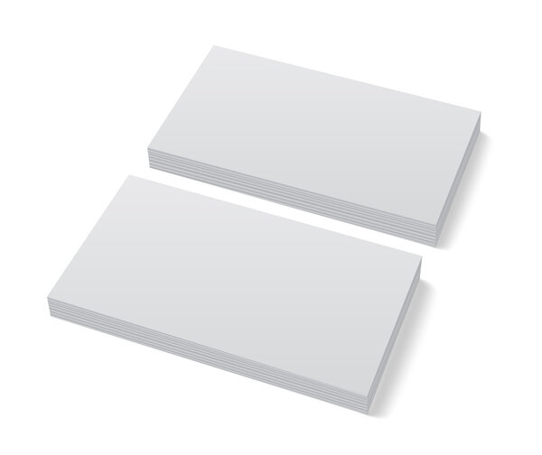 Two stacks of blank business cards on white background