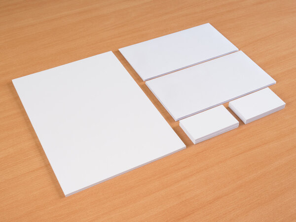 Stationary set isolated on light wooden table. 