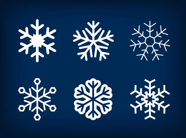 Colección de copos de nieve vector blanco sobre fondo azul . — Vector de stock