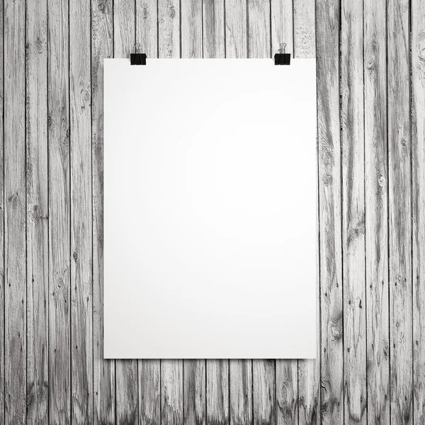 Blank poster on clips Stock Photo by ©FilL239 78943172