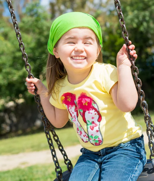 Little girl on swing — Stock Photo, Image