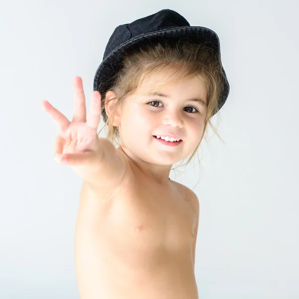 Girl in hat smiling — Stock Photo, Image