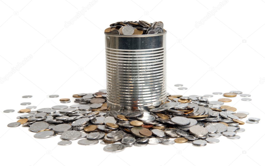 Coins and can on white background