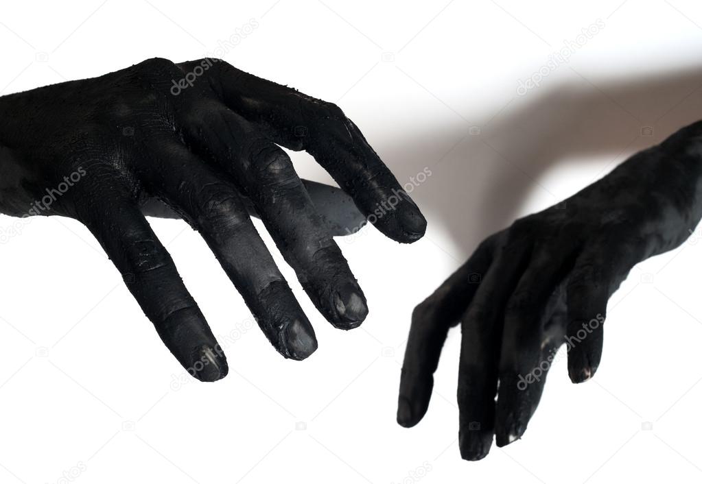 Black painted hands