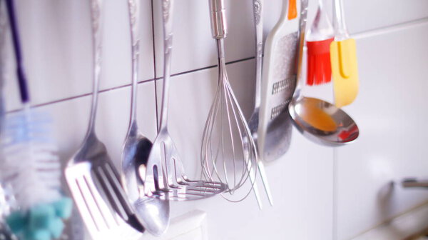 kitchen accessories hanging on the wall