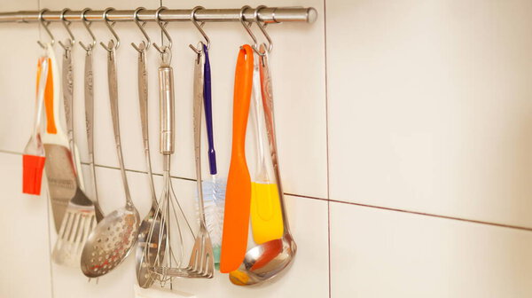 kitchen accessories hanging on the wall