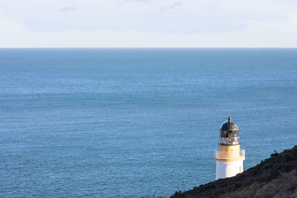 Morze Irlandzkie i latarnia morska — Zdjęcie stockowe