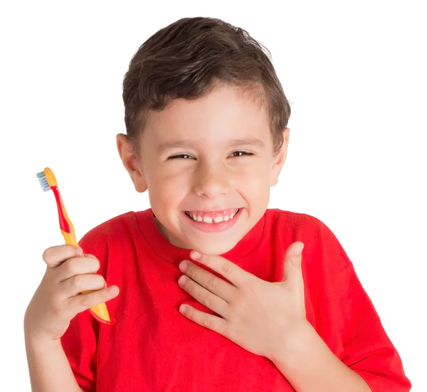 Adorable garçon se sentant heureux avec sa nouvelle brosse à dents — Photo