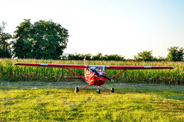 Airplane grounded on airfield — Stock Photo, Image