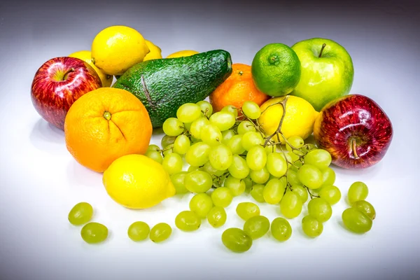 Real colorful fruits painted with light — Stock Photo, Image