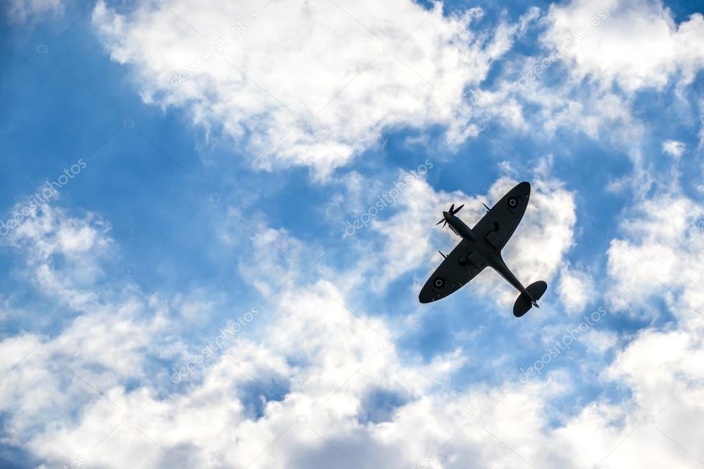 Spitfire on blue cloudy sky over Bratislava for honor best Czechoslovakian pilot Otto Smyk 312sq