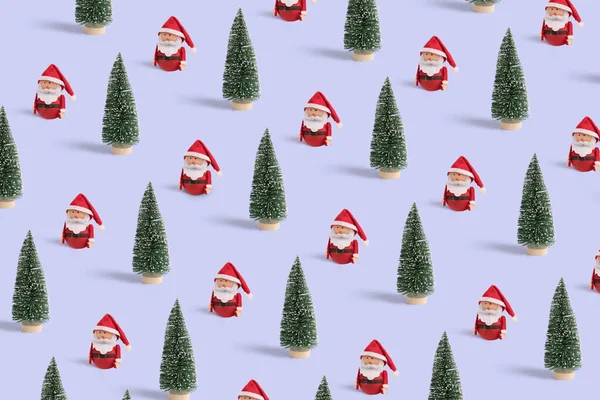 Winter Pattern Santa Clause Green Christmas Trees Pastel Blue Background — Stock Photo, Image