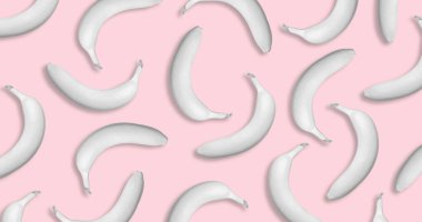 Pembe arka planda beyaz muzların renkli meyve deseni. Yaratıcı asgari yaz konsepti. Düz yatıyordu