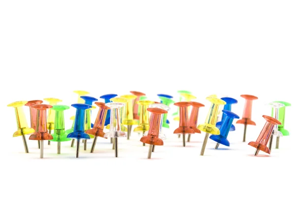 Ejército de pinchos de papelería coloridos y solitarios — Foto de Stock