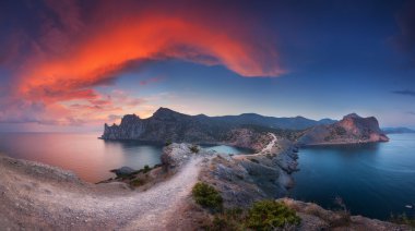 Beautiful panoramic landscape with mountains, sea at sunset