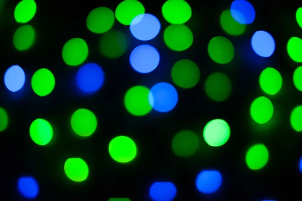 Intreepupil kerstverlichting. Nieuwjaar bokeh. Abstracte achtergrond — Stockfoto