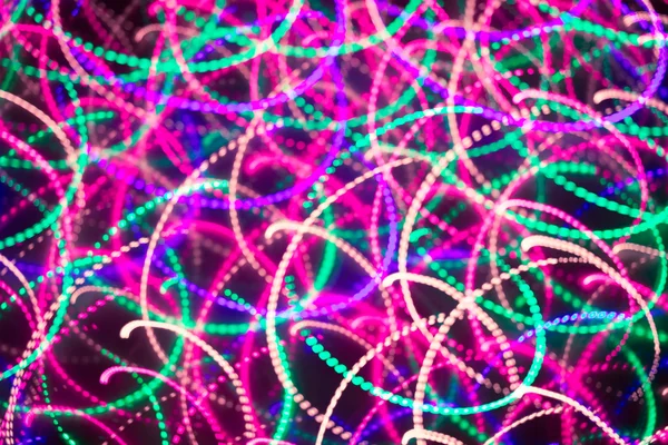 Luces navideñas desenfocadas con desenfoque de movimiento. Bokeh Año Nuevo. Abdominales — Foto de Stock