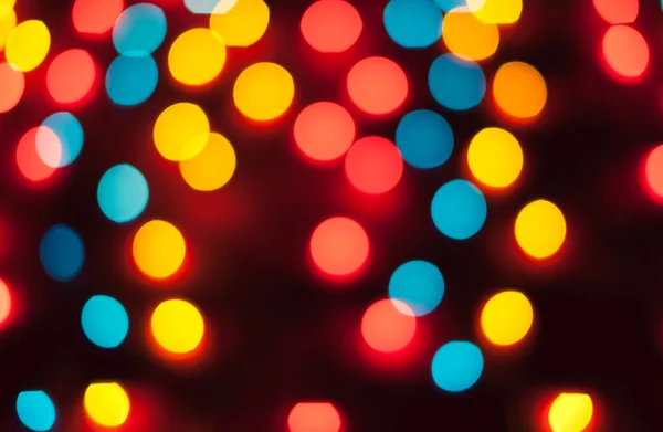 Luces de Navidad desenfocadas. Bokeh Año Nuevo. Fondo abstracto — Foto de Stock