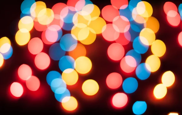 Luces de Navidad desenfocadas. Bokeh Año Nuevo. Fondo abstracto — Foto de Stock