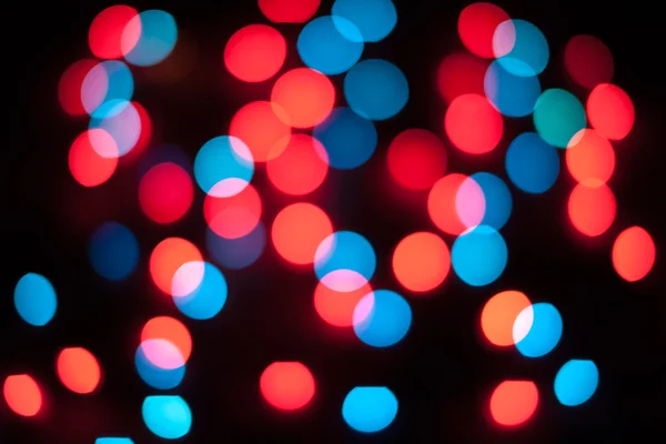 Luces de Navidad desenfocadas. Bokeh Año Nuevo. Fondo abstracto — Foto de Stock