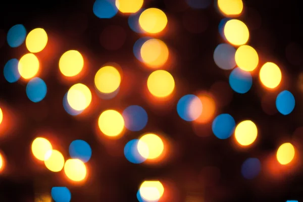 Luces de Navidad desenfocadas. Bokeh Año Nuevo. Fondo abstracto — Foto de Stock