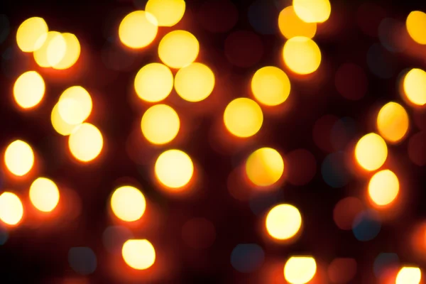 Luces de Navidad desenfocadas. Bokeh Año Nuevo. Fondo abstracto — Foto de Stock